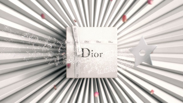 Magical silver star flying over a Dior gift box