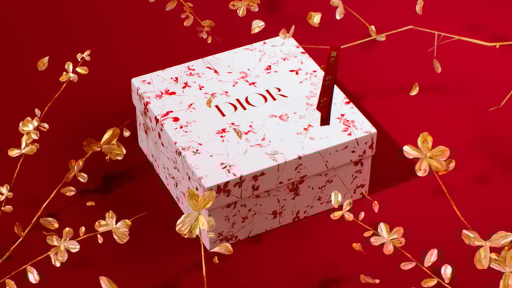 Chinese New Year 3D visual with a Dior box and golden flowers