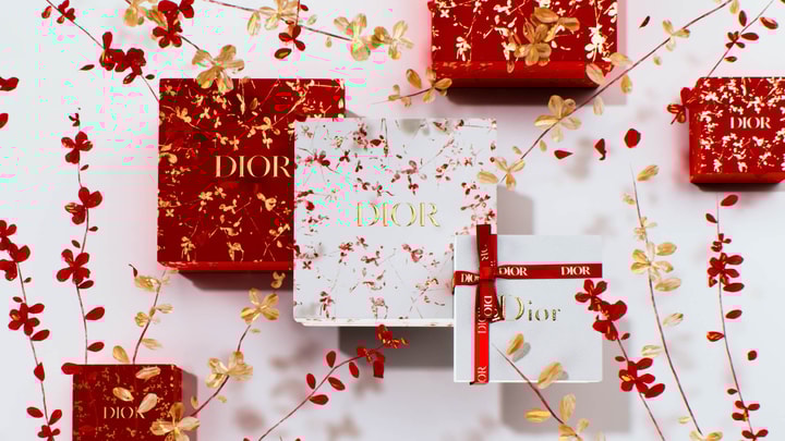 Chinese New Year 3D visual with a Dior boxes and golden flowers