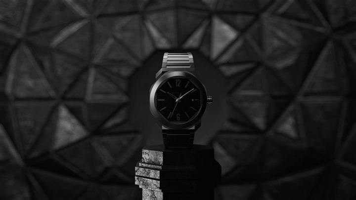 Bulgari Octo watch in a 3D environment with geometric patterns and dark concrete materials