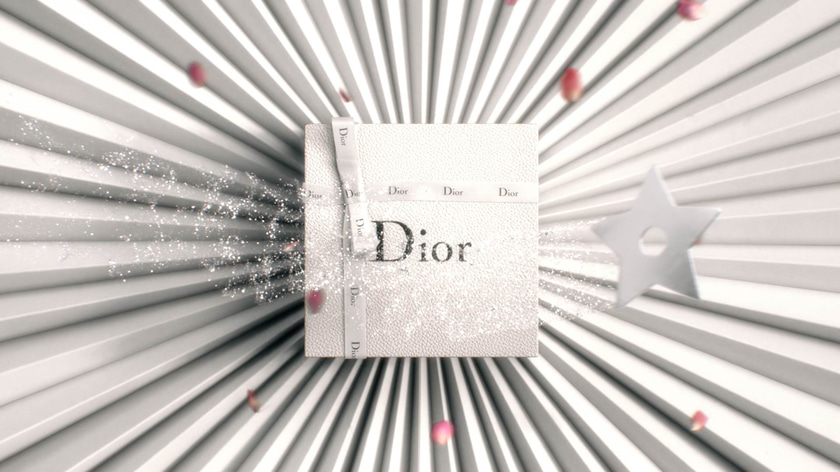 Magical silver star flying over a Dior gift box