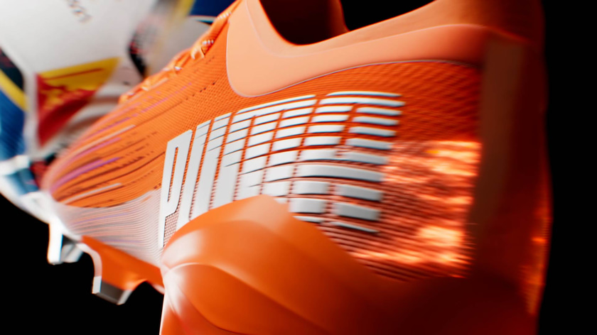 Motion Design animation of luminescent particles flowing around a soccer shoe