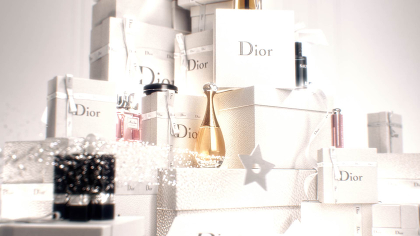 3D Motion Design with Dior products on top of gift boxes with magical particles