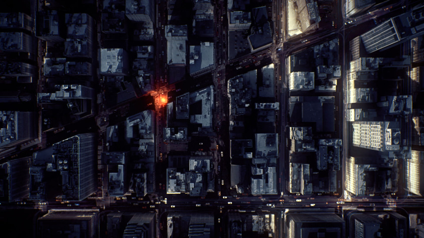 Aerial shot of a city with an orange luminous particle glowing